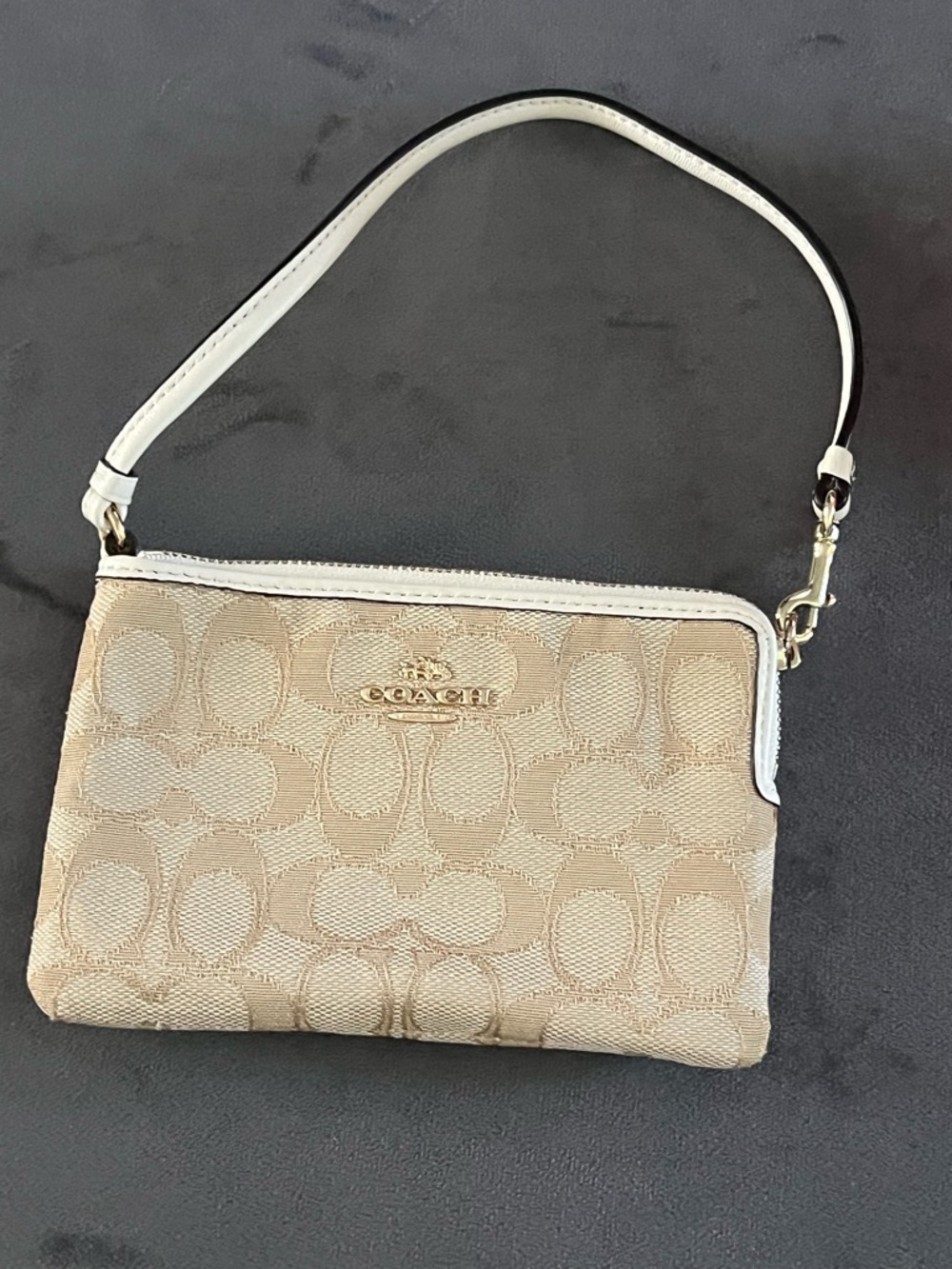 Coach Corner Zip Wristlet in Signature Canvas and leather trim